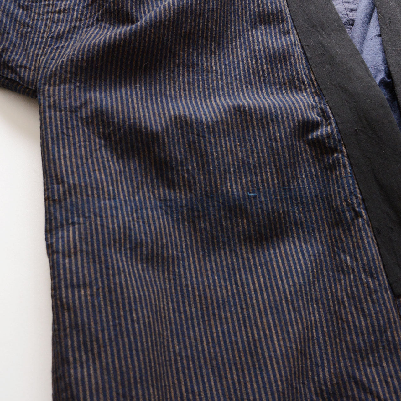 Rural Japanese work jacket noragi from mid-Showa period with classic indigo stripes
