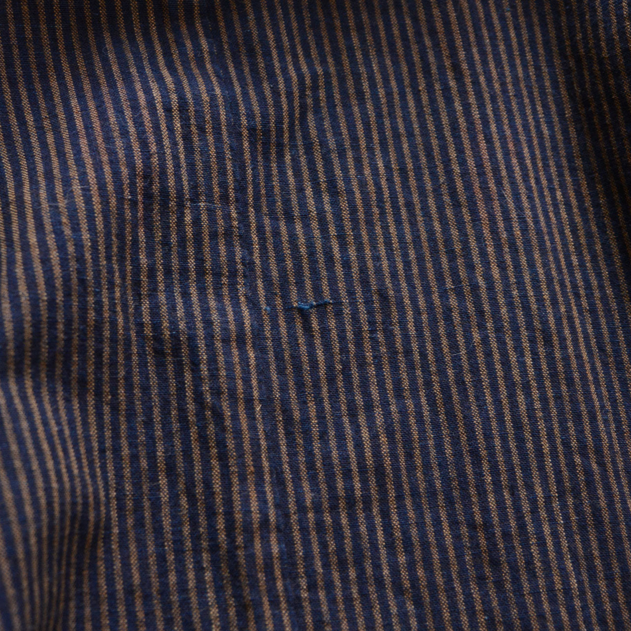 Authentic Japanese noragi jacket combining striped indigo cotton and functional design