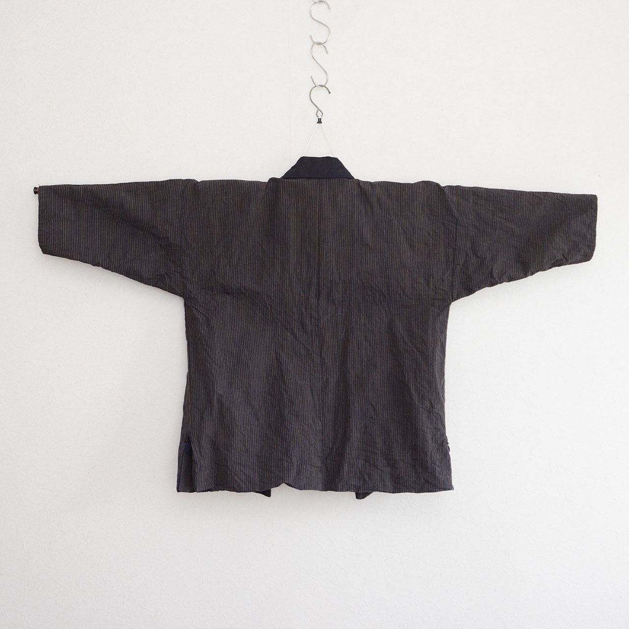 Hand-stitched vintage Japanese noragi showcasing authentic craftsmanship