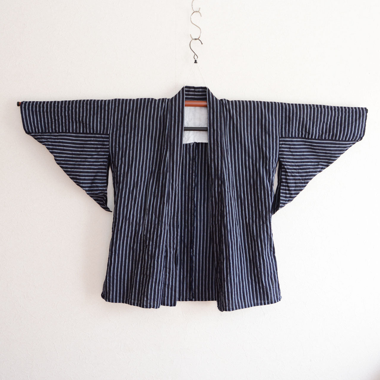 Japanese vintage noragi kimono featuring traditional striped cotton textile and handmade construction