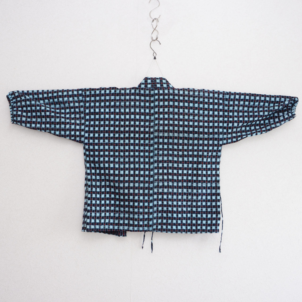 Vintage Japanese noragi uwappari work jacket, indigo-dyed check cotton, mid-Showa era, Tohoku Japan, 100% cotton, back view, kimono hanger