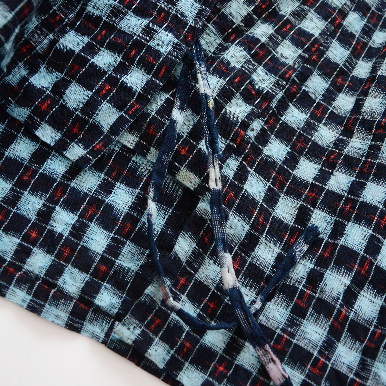 Indigo kasuri haori ties, vintage Japanese noragi uwappari jacket, mid-Showa era, hand-dyed cotton, closure detail