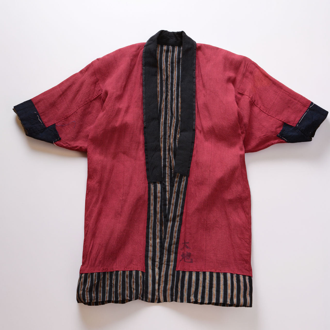 Vintage noragi jacket, inner side (crimson red cotton), laid flat, front view — mid Showa era, Tohoku, Japan vintage