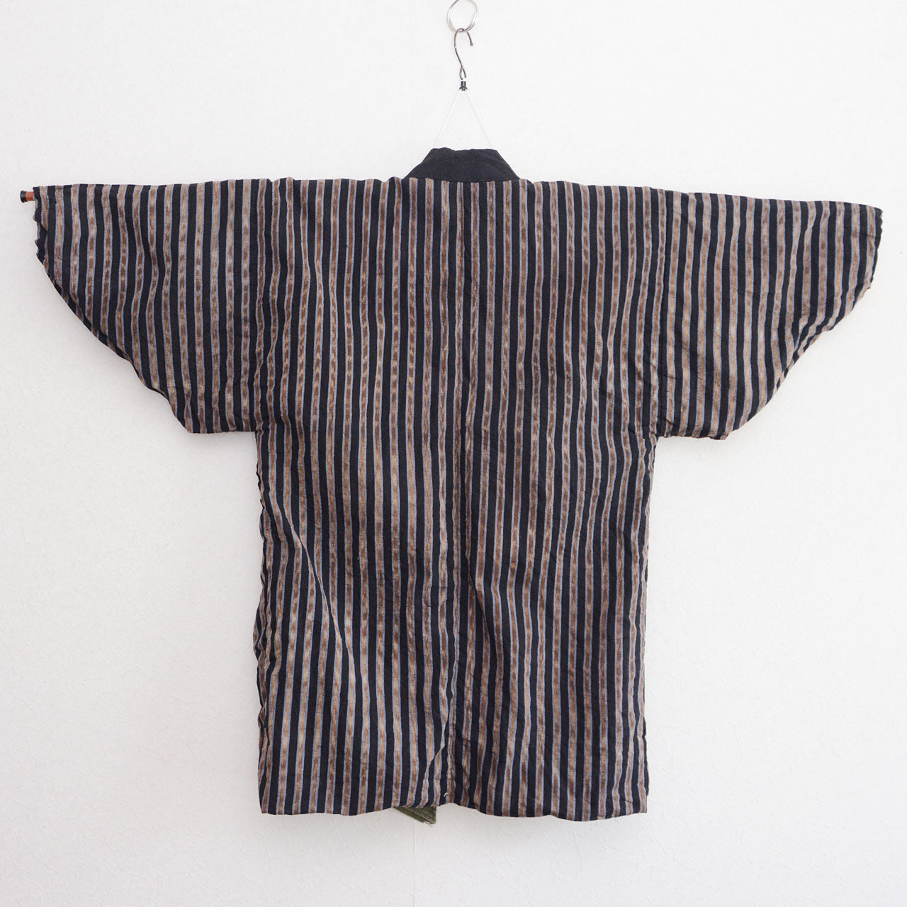 Vintage noragi jacket, outer side (gradient stripe cotton), on kimono hanger, back view — mid Showa era, Tohoku, Japan vintage