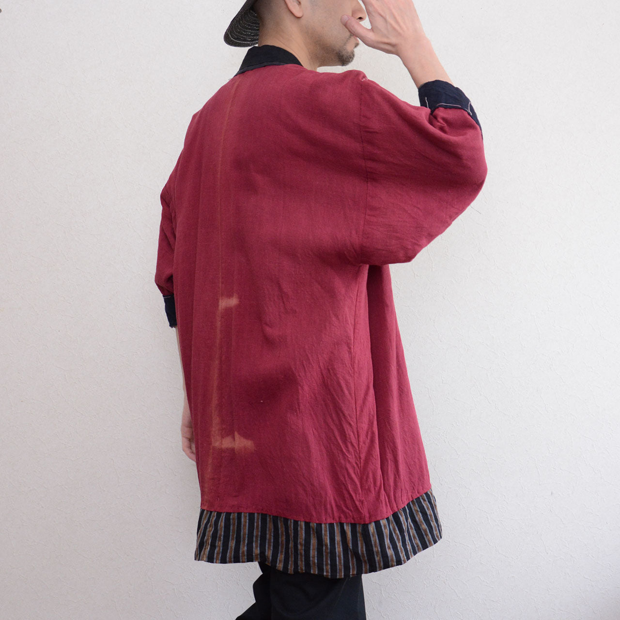 Vintage noragi jacket worn by male model, side view — gradient stripe outer, mid Showa era, Tohoku, Japan vintage