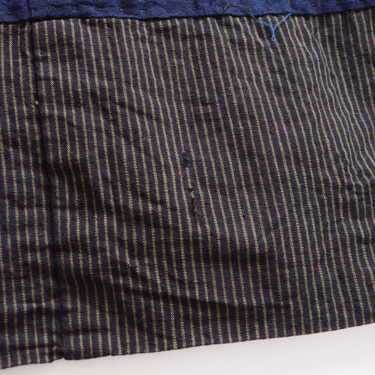 Fabric slippage, vintage cotton noragi jacket, early Showa Japan