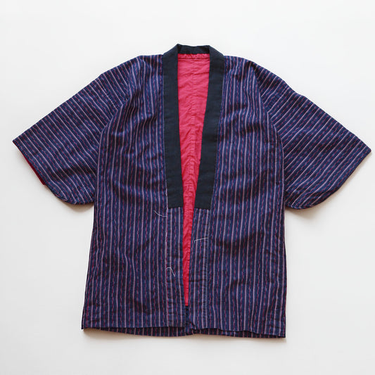 Navy cotton stripe noragi jacket, laid flat, front view