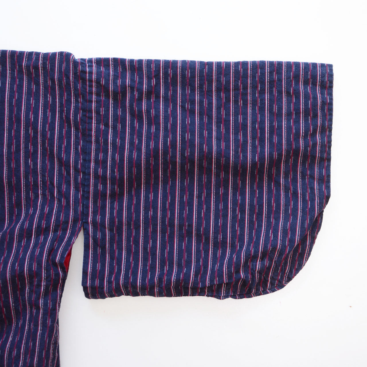 Sleeve detail, navy cotton stripe noragi jacket