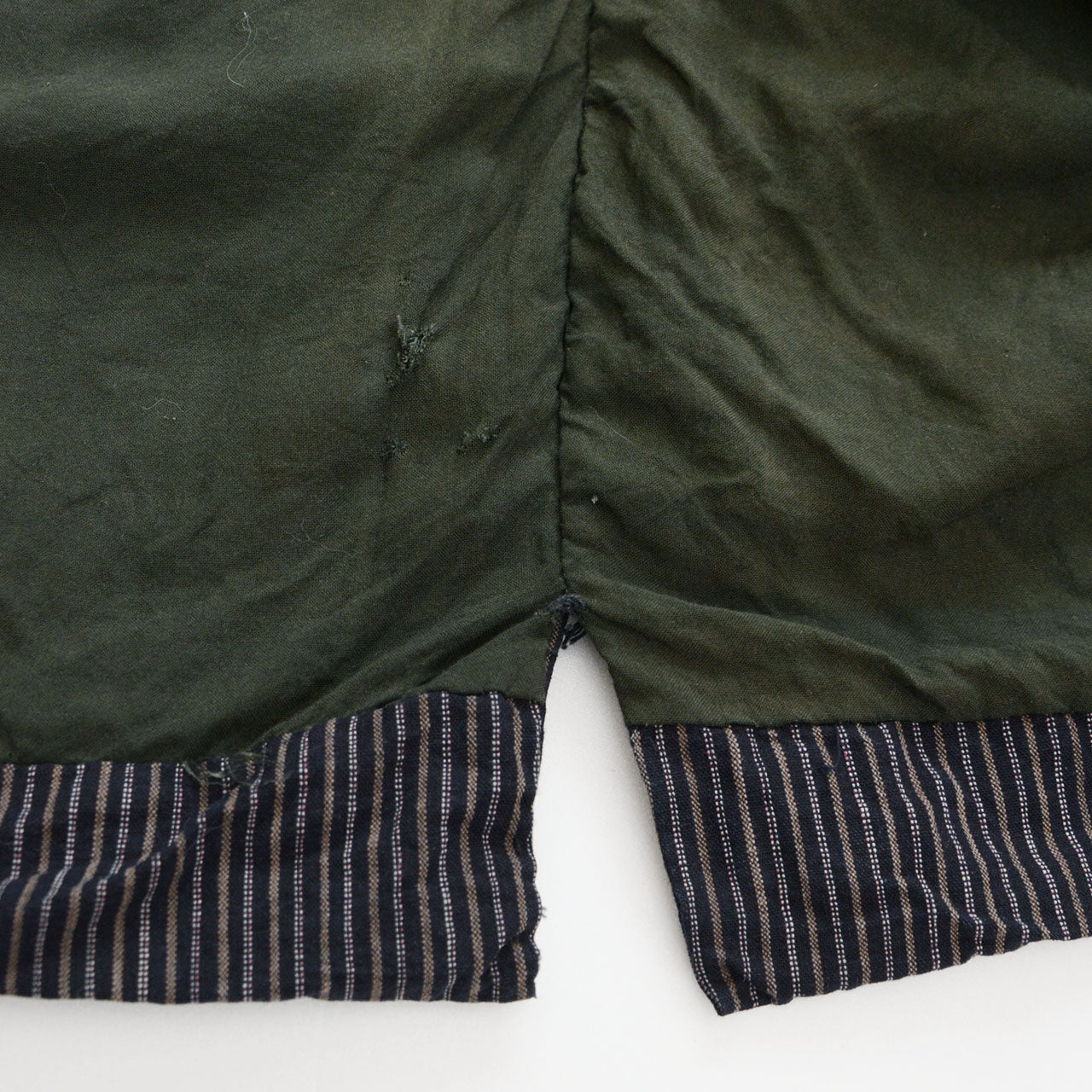 Side slit of vintage Japanese noragi jacket, vertical stripe cotton, early Showa era