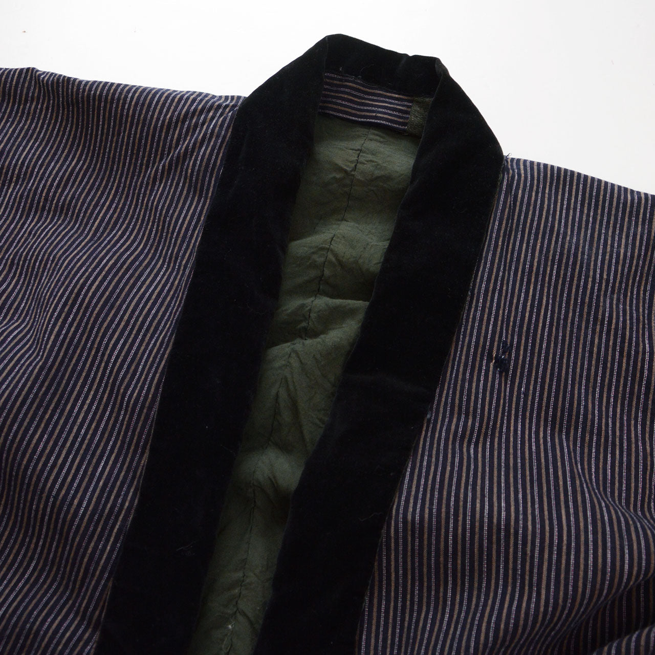 Black velvet collar of vintage Japanese noragi jacket, close-up detail, early Showa era