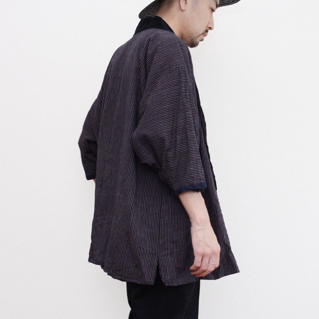 Vintage Japanese noragi jacket worn, vertical stripe cotton with black velvet collar, back side view, early Showa era