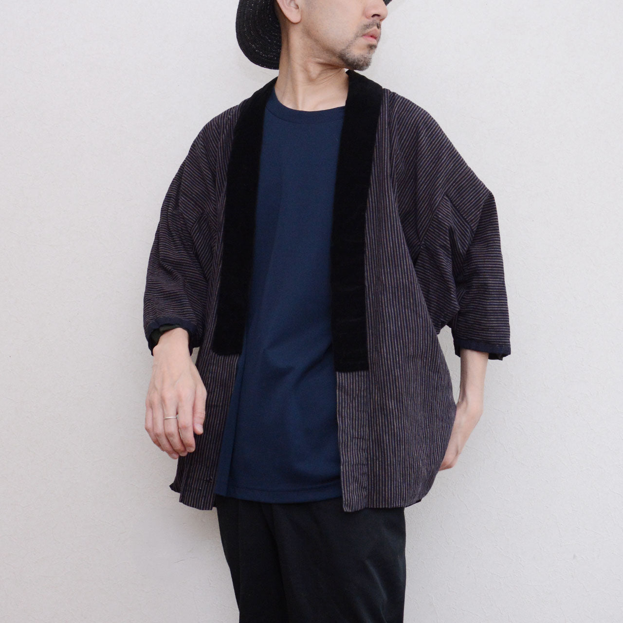Vintage Japanese noragi jacket worn, vertical stripe cotton with black velvet collar, front view, early Showa era
