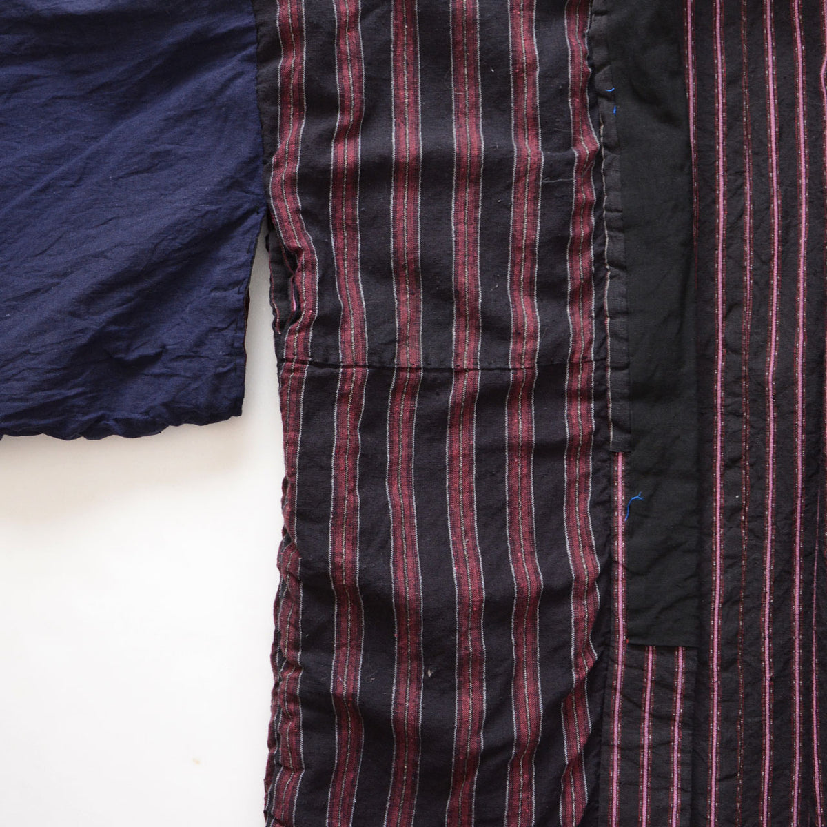 Joined section in the body on the reverse side of a Japanese vintage striped cotton noragi