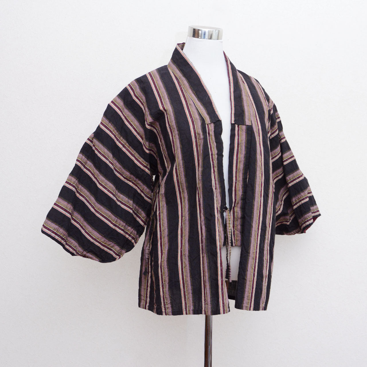 Vintage Japanese noragi garment made from striped cotton textile