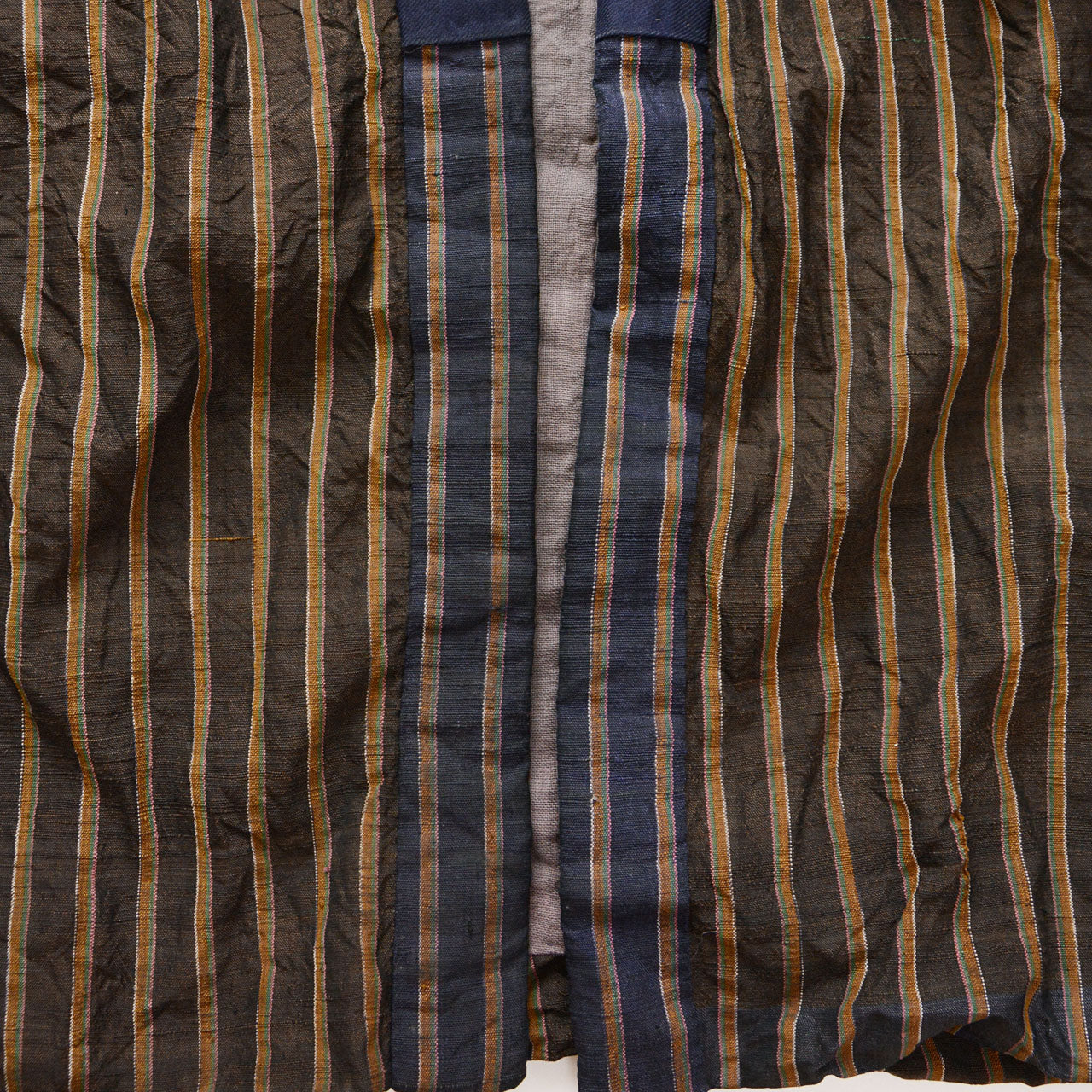 Vintage Japanese noragi jacket, Showa era, gray mixed fabric body with contrasting navy collar in different fabric, crazy pattern construction detail, front view