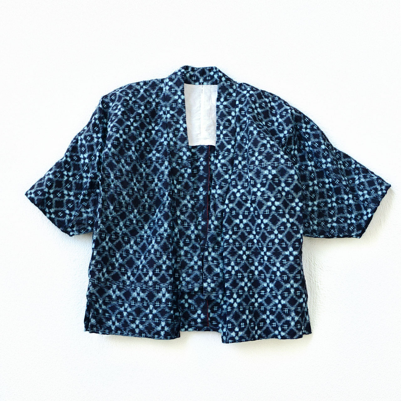 Indigo-dyed cotton noragi from mid-Showa era Japan with igeta kasuri ikat pattern