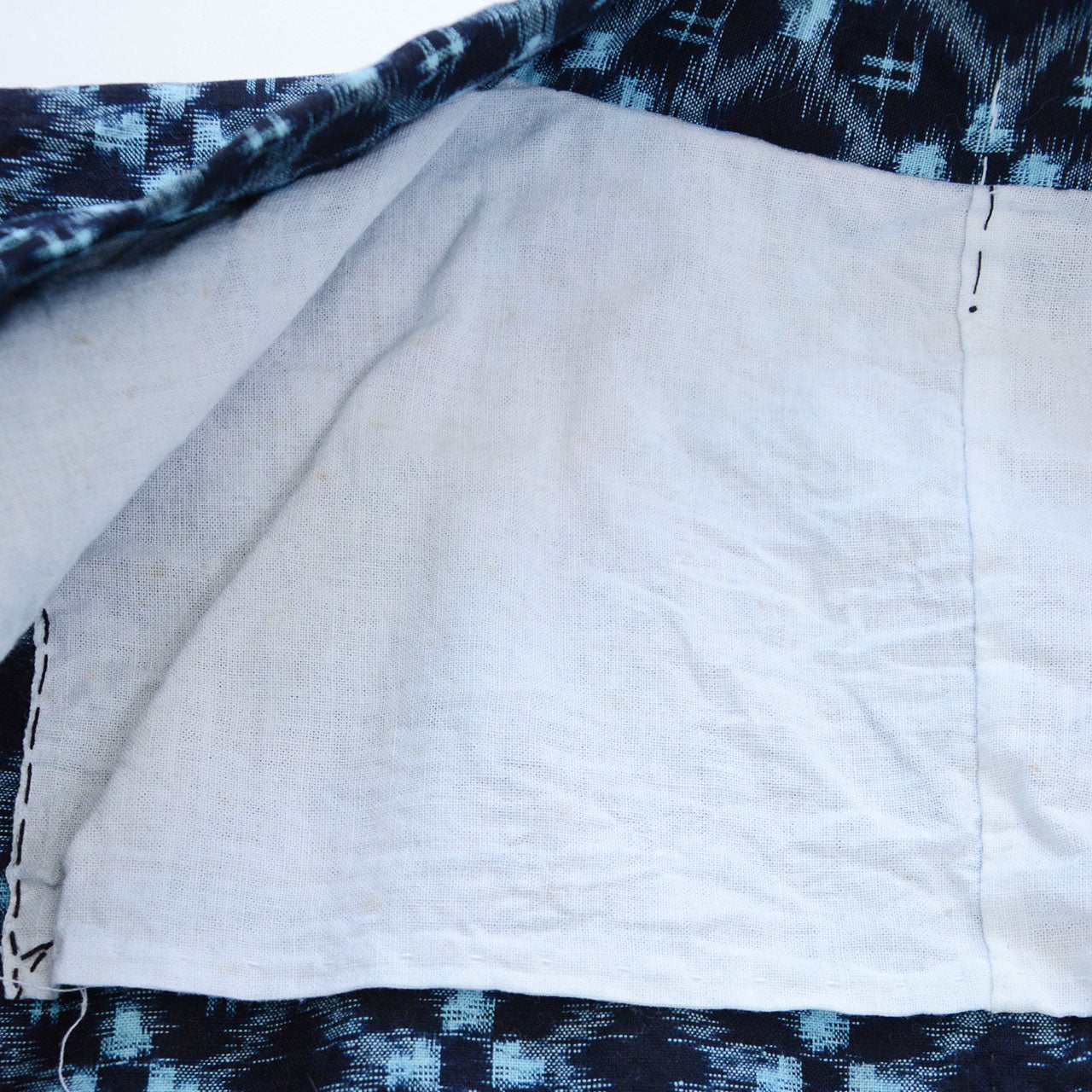 Antique Japanese noragi in indigo-dyed cotton with rare irregular ikat geometric pattern