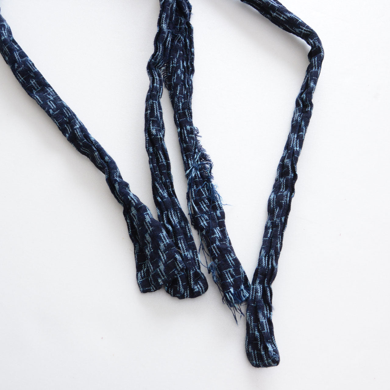 Japanese monpe work pants made from indigo kasuri cotton fabric