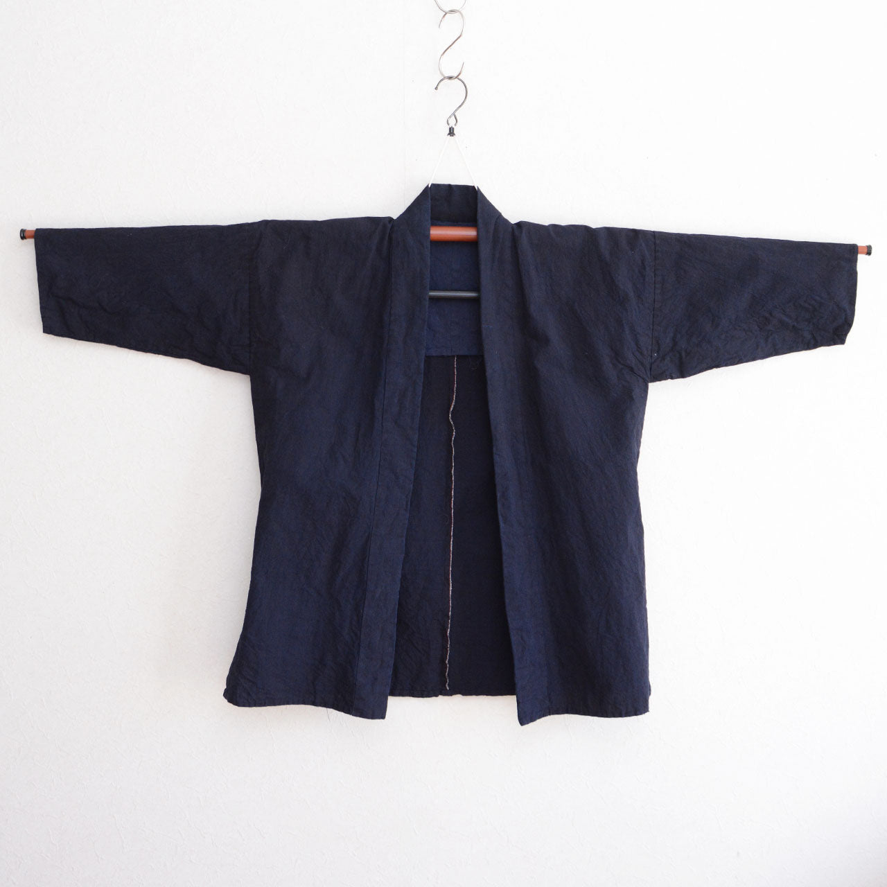 A traditional Japanese noragi constructed using indigo-dyed cotton.