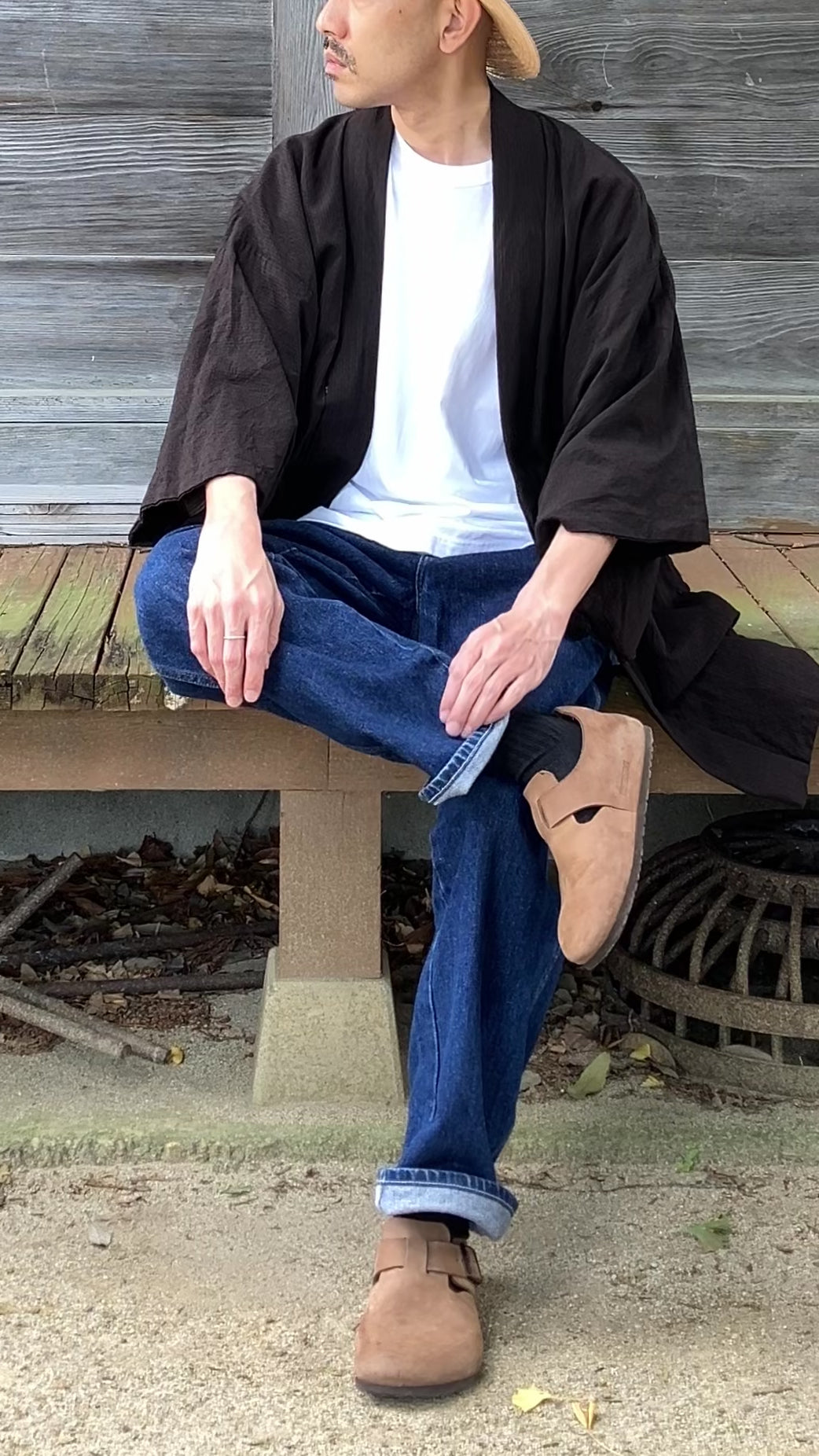 Japanese vintage haori styled on a man at a traditional shrine