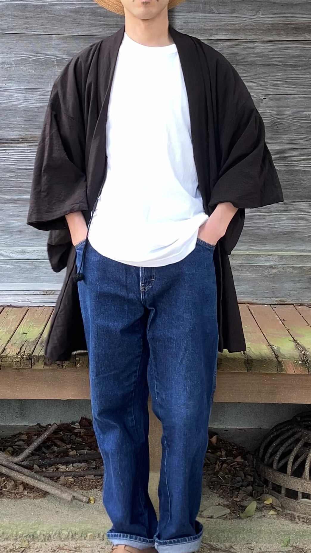 Man wearing a haori jacket styled with T-shirt, jeans, and Birkenstock