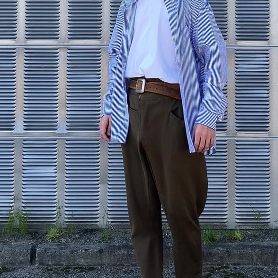 Model walking in 1940s vintage jodhpurs, highlighting classic riding-inspired design.