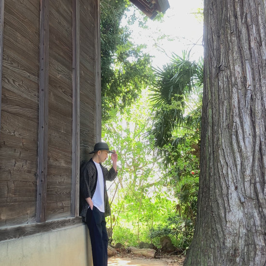 Vintage Japanese noragi, rare plaid cotton, indigo collar, worn at a Shinto shrine, Showa era workwear styled in traditional Japanese setting