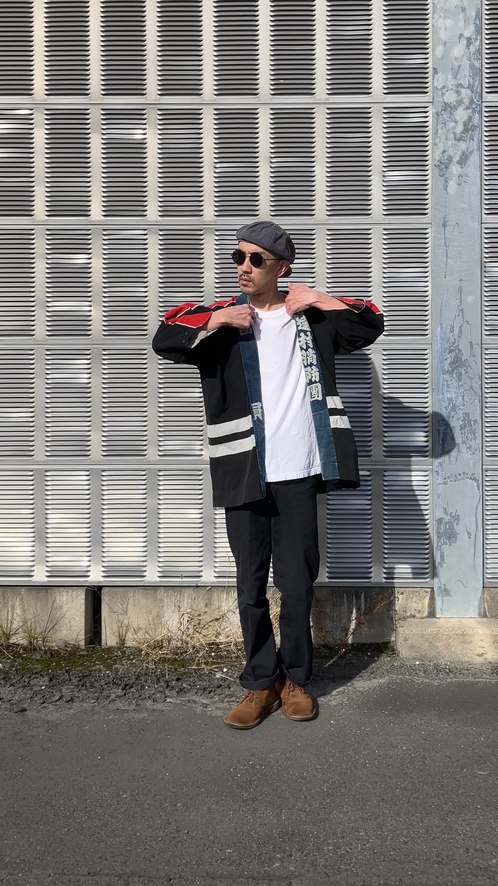 Vintage Japanese hanten and happi coat styled with workwear pants and boots