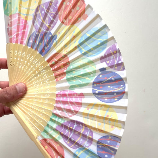 Demonstration of fan creating a gentle breeze