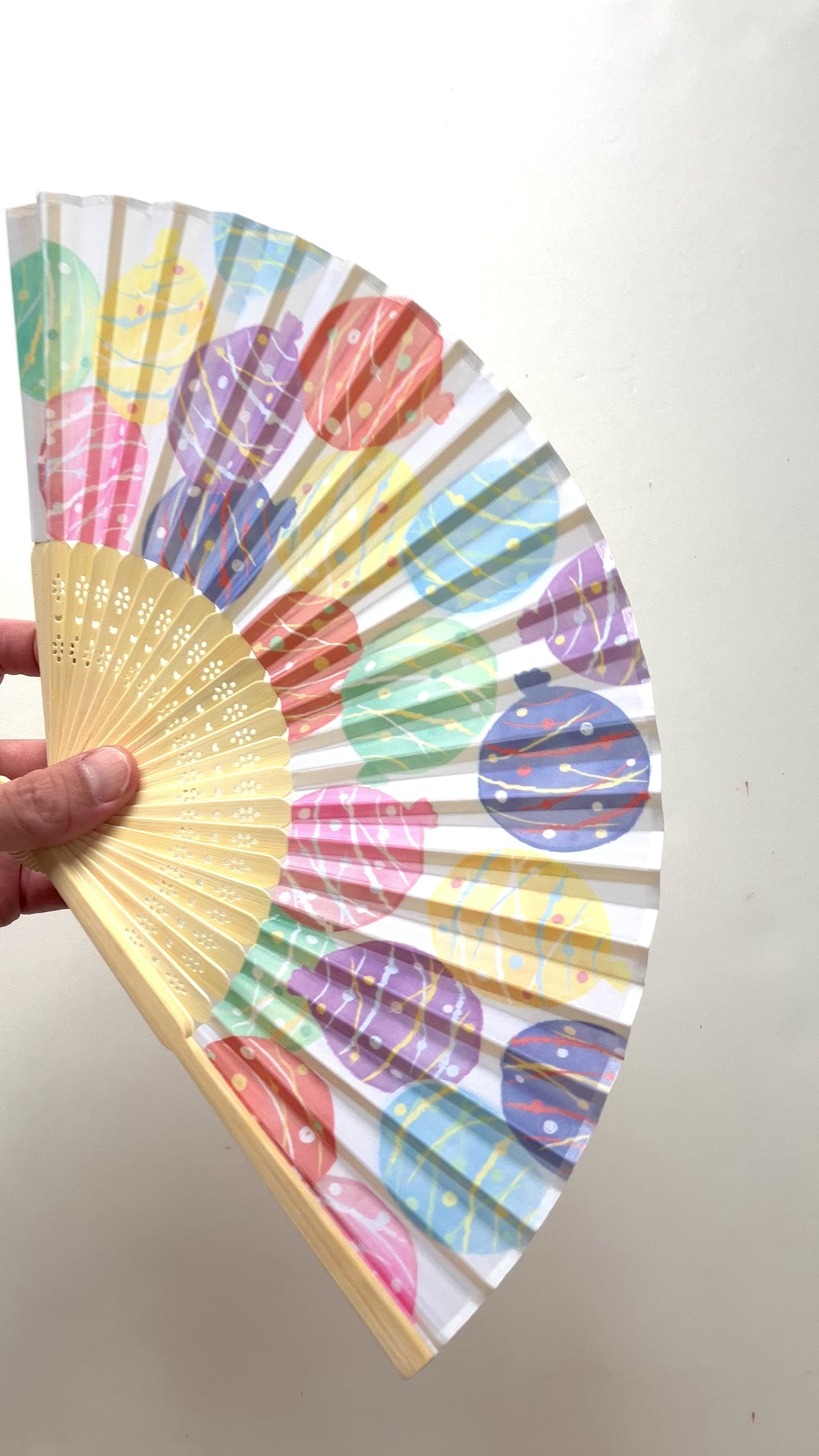 Demonstration of fan creating a gentle breeze