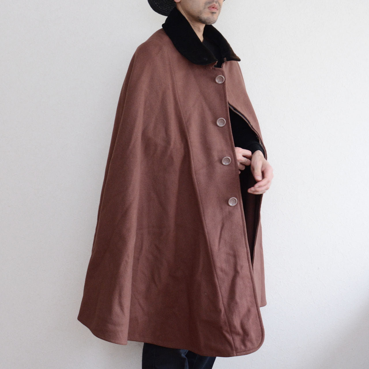 Mid-Showa Japanese wool mantle outerwear with a calm, understated presence.
