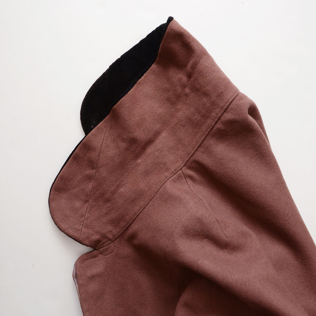 Wool mantle outerwear from Japan with a timeless, understated character.