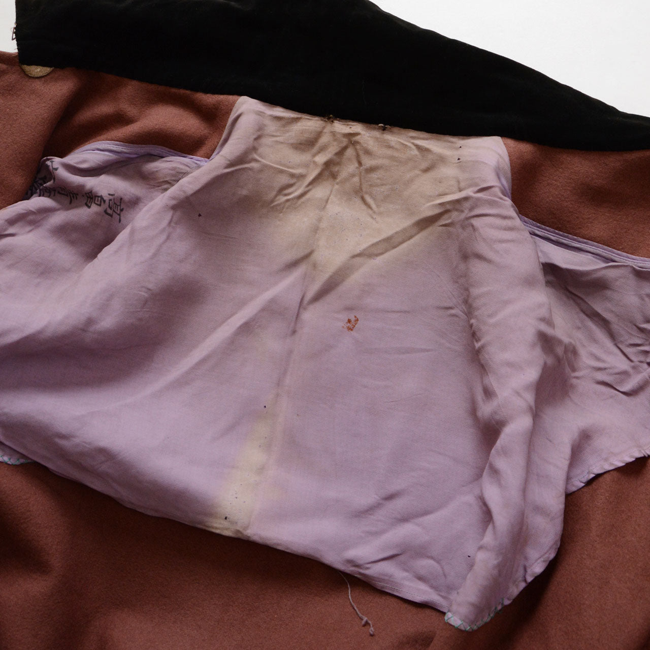 Mid-Showa mantle outerwear representing transitional Japanese fashion.