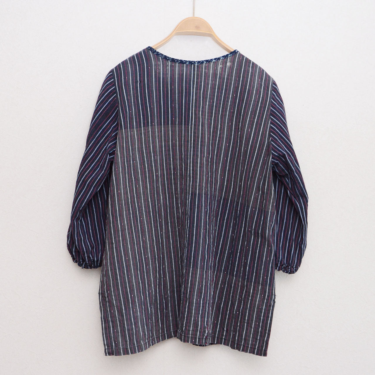 Vintage Japanese remake tunic on hanger, Showa-era stripe cotton, back view