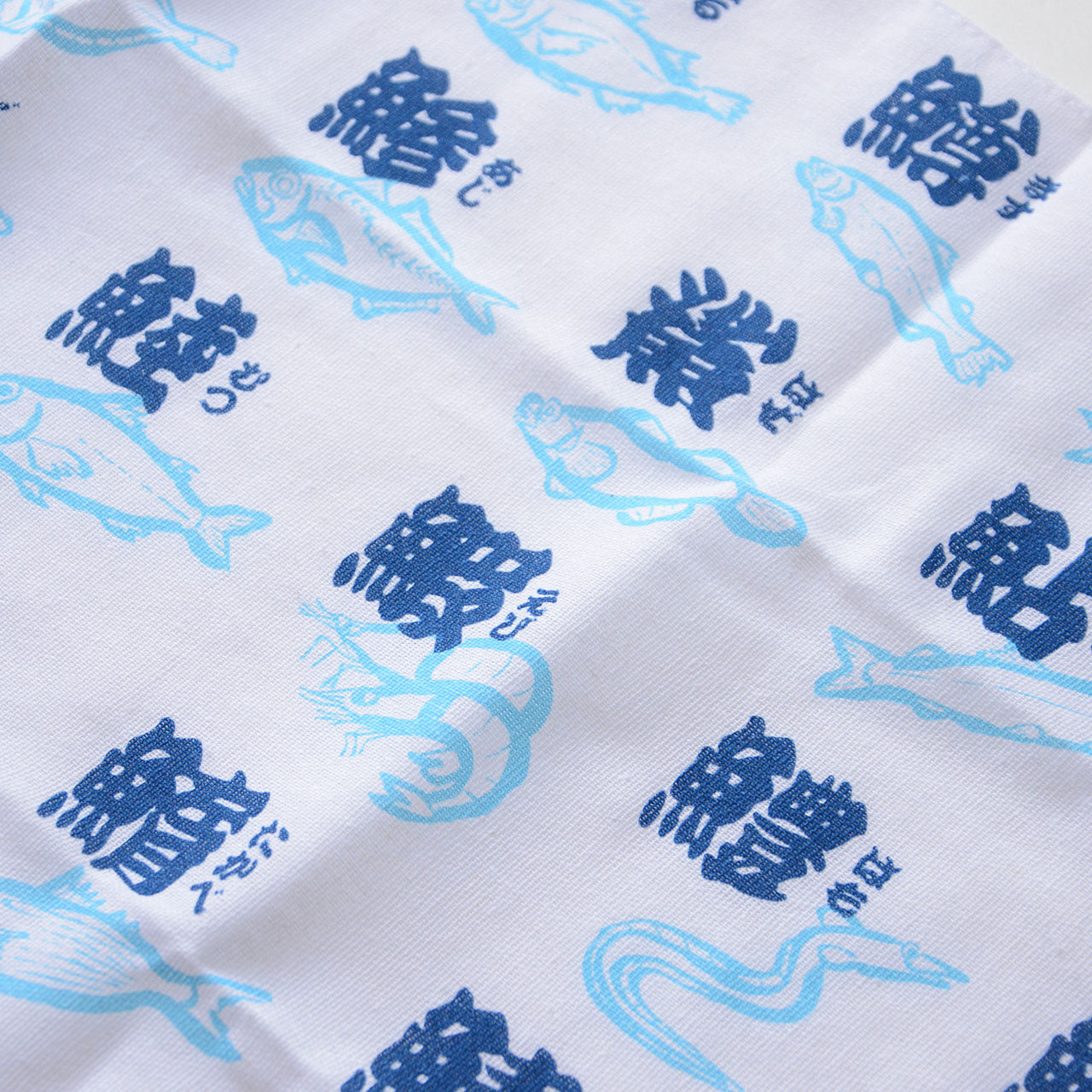 Multi-purpose cotton tenugui with fish characters and illustrations