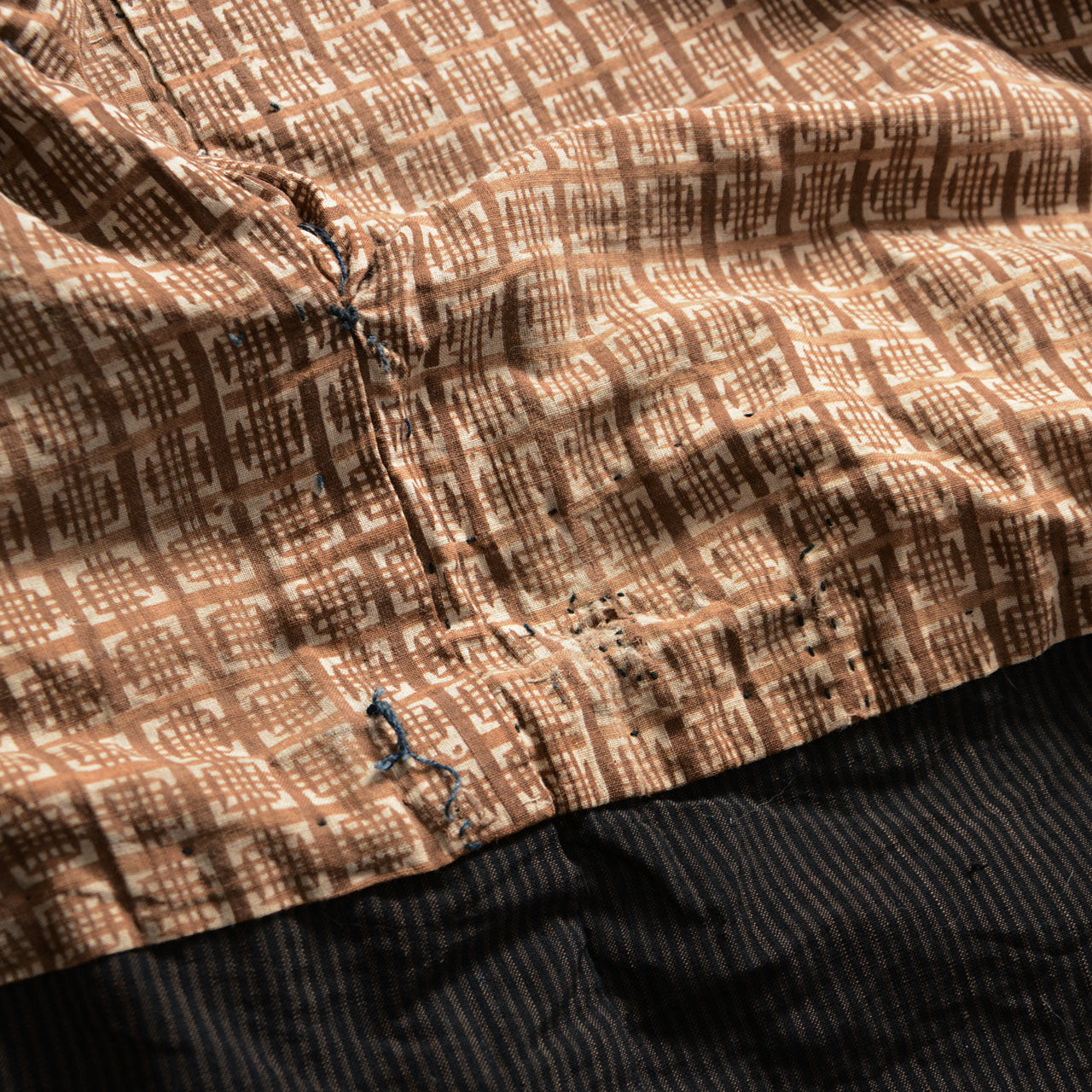 Japanese vintage noragi garment with repaired cotton lining