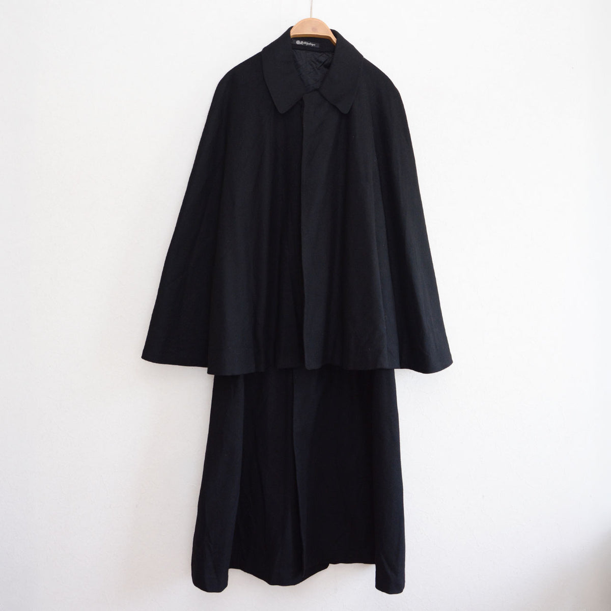 Matsuzakaya black wool tonbi coat with layered cape and collar, early Showa Japanese vintage