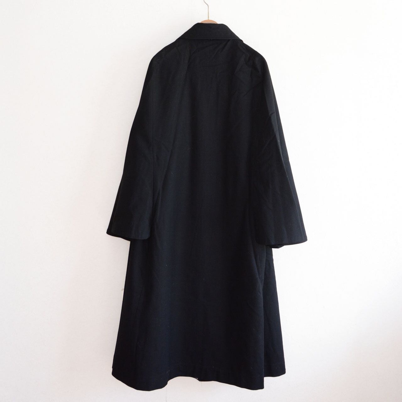 Black wool tonbi mantle coat, back view on hanger, double-cape construction, Taisho–Early Showa Japan vintage