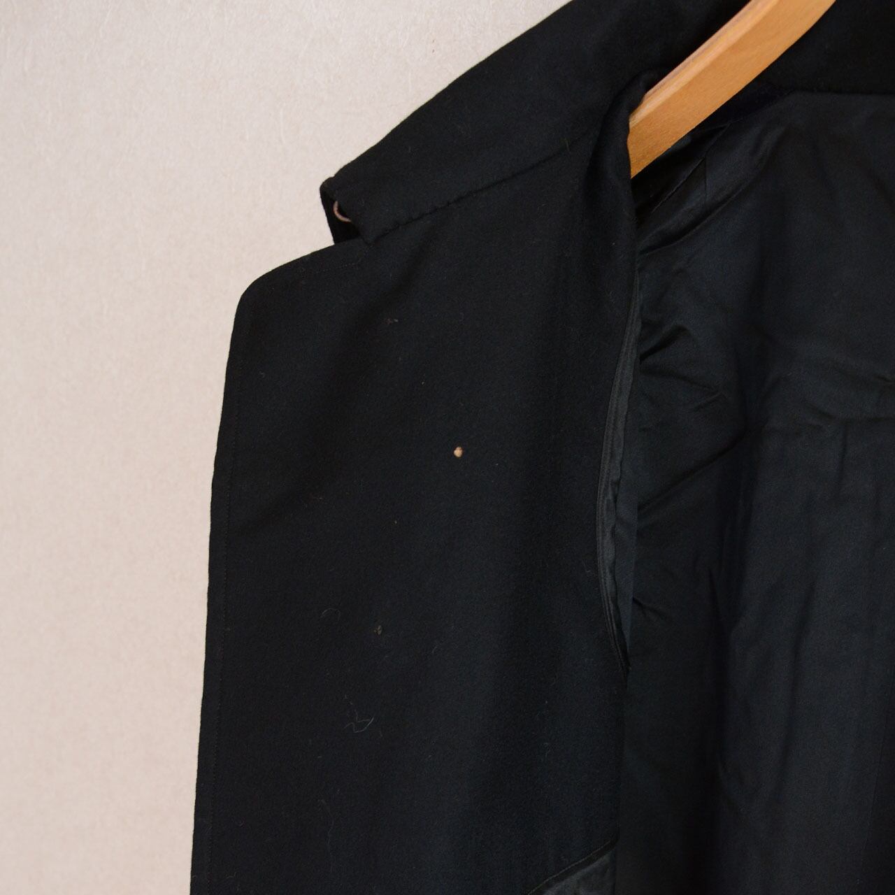 Inner side of fly front closure, black wool tonbi mantle, Japan vintage