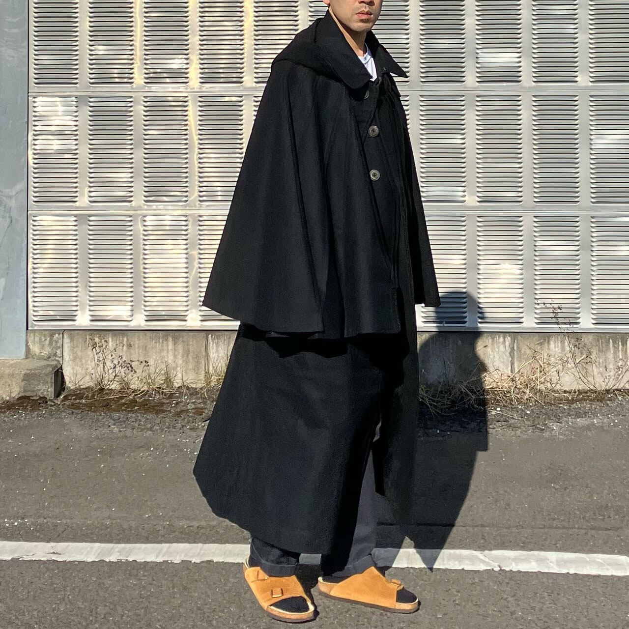 Model wearing black wool tonbi mantle with BIRKENSTOCK Zürich sandals, Japan vintage outerwear styling