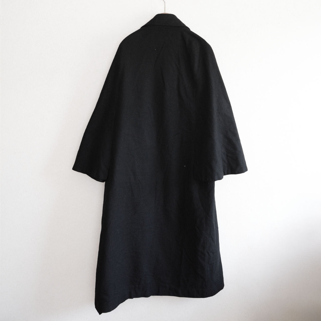 Early 20th century Japanese outerwear showcasing traditional cape construction