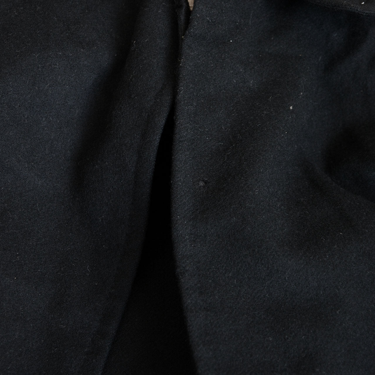 Classic Japanese wool mantle with a timeless minimalist presence