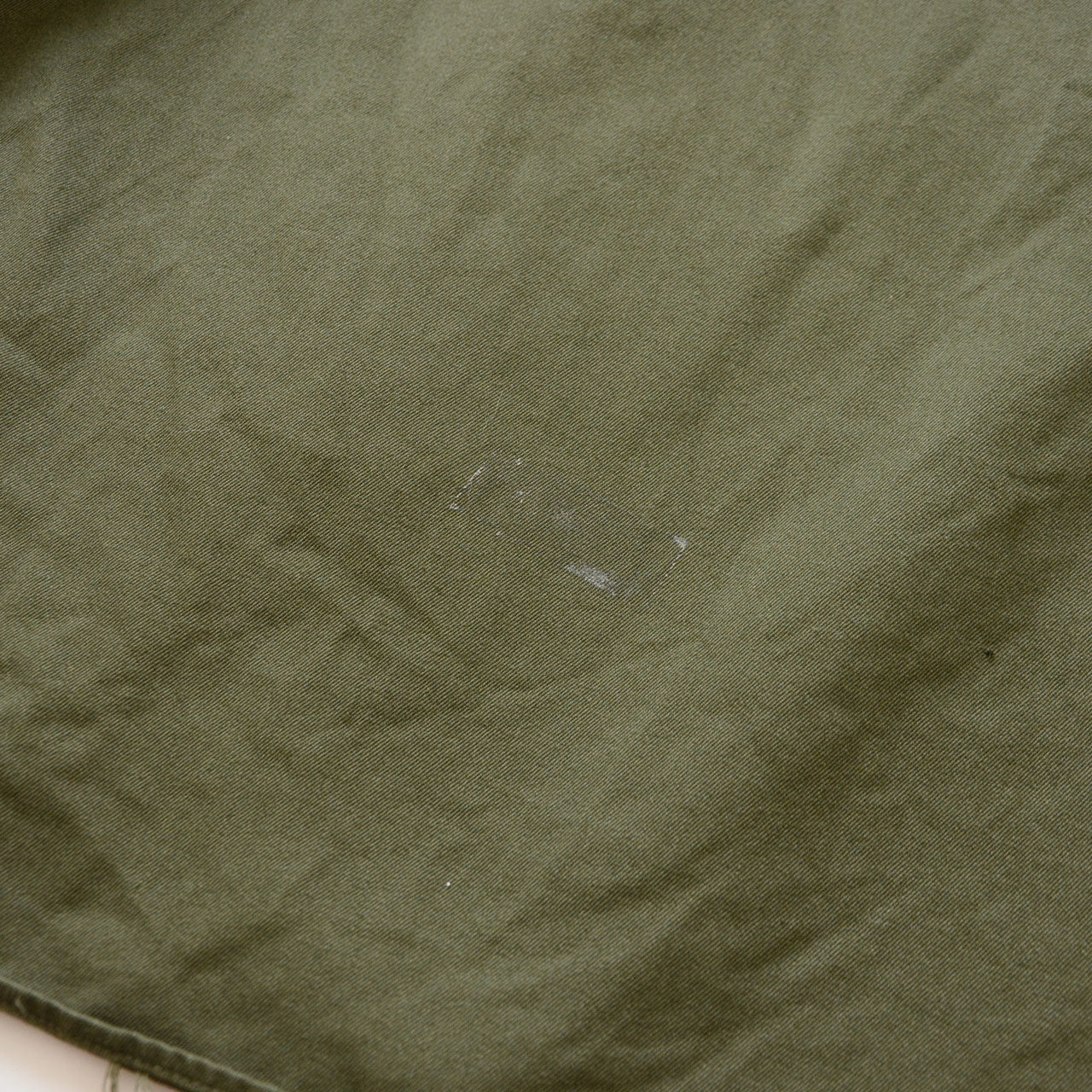 Sticker residue detail, JGSDF Type 65 work jacket, interior fabric