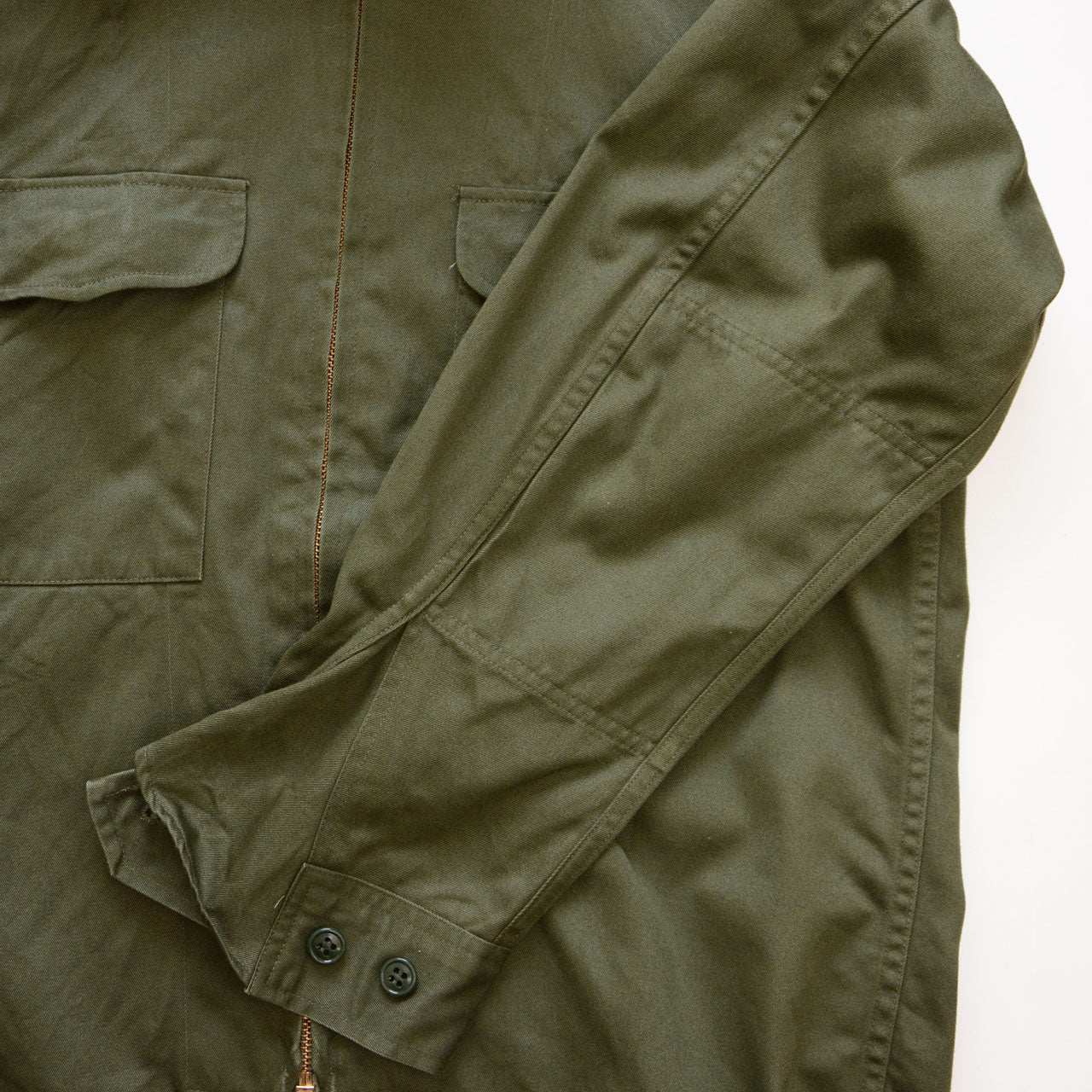 Elbow reinforcement panel and gusseted cuff detail, JGSDF Type 65 work jacket, cotton-vinylon