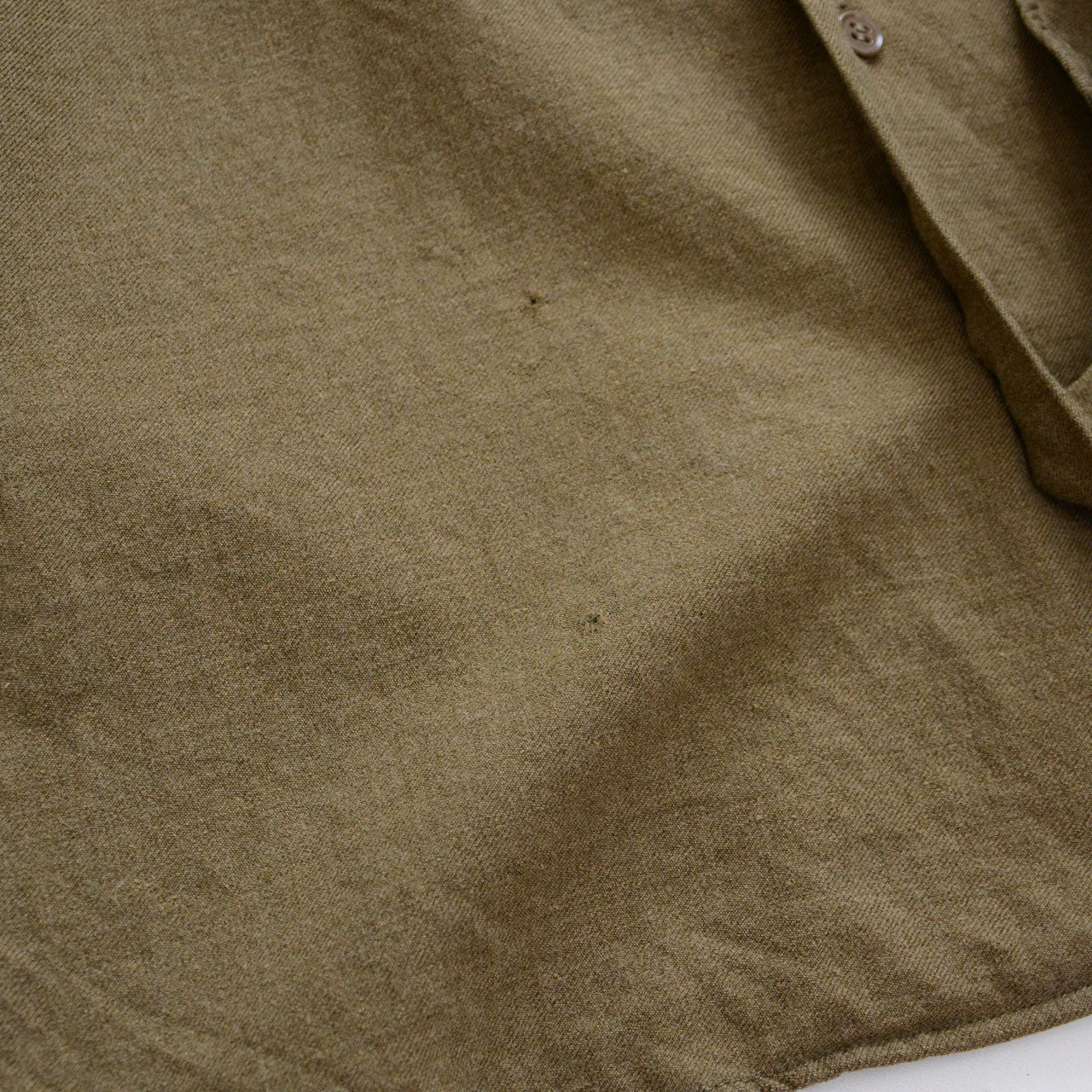 Authentic U.S. Army shirt with missing gas flap
