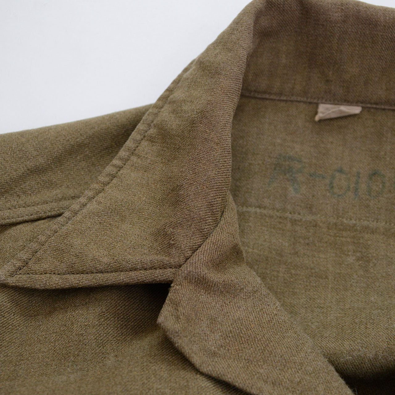 WWII U.S. Army M-37 shirt paired with cotton pants