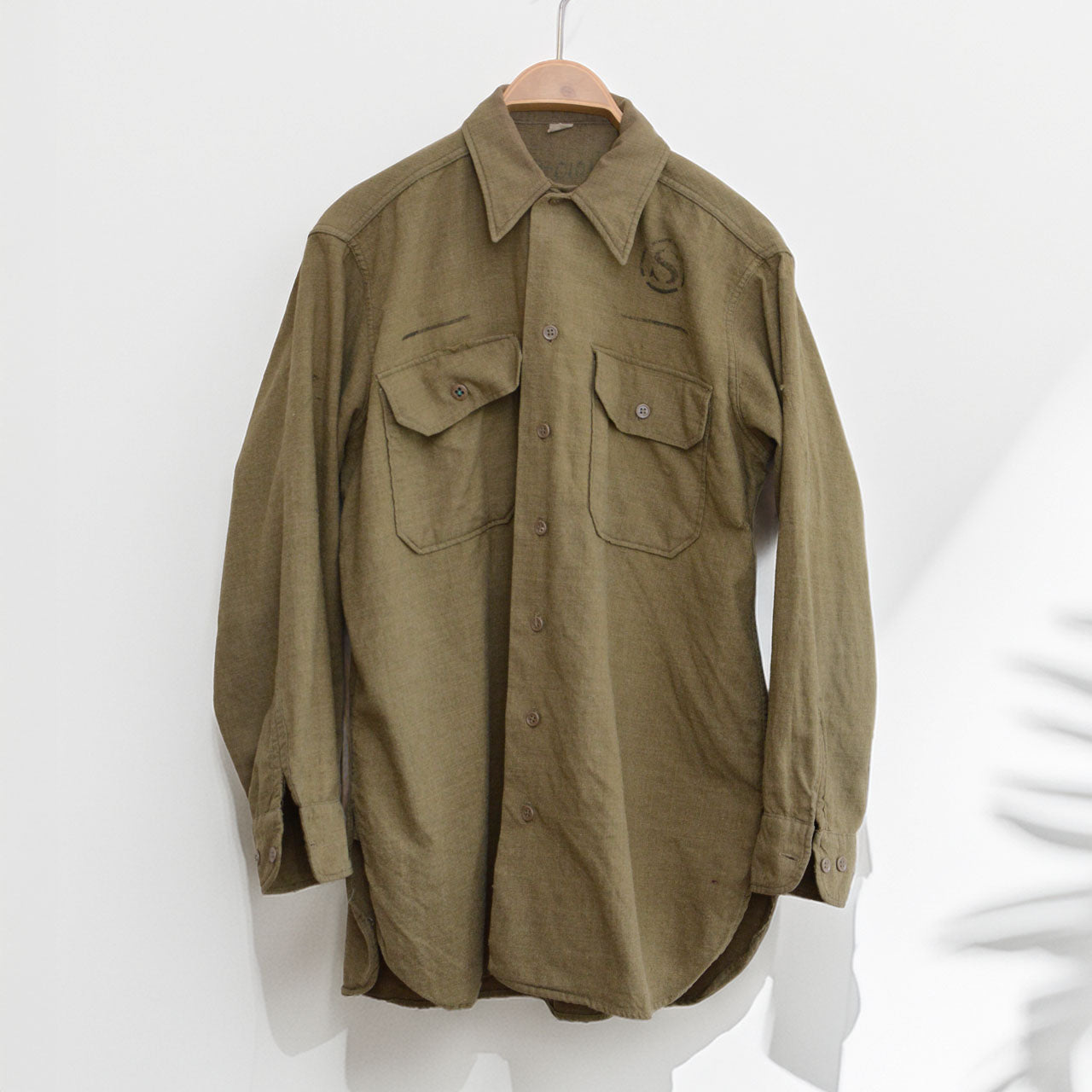 Authentic U.S. military wool field shirt with stencil marking