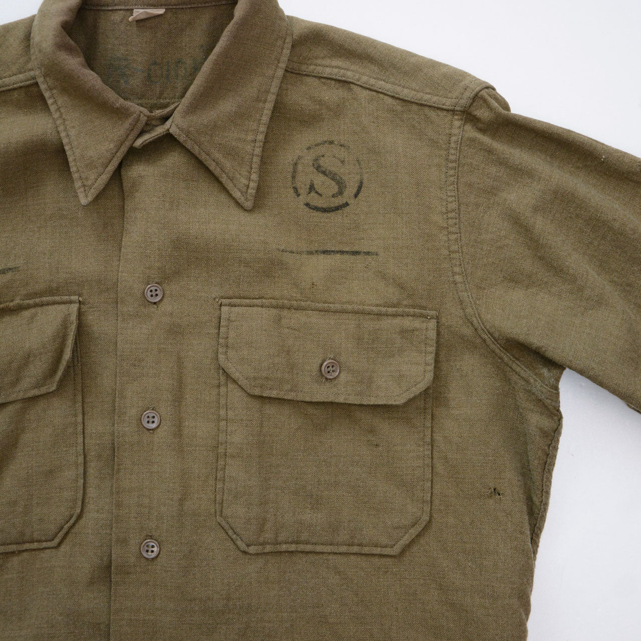 WWII-era U.S. Army wool shirt in mustard brown tone