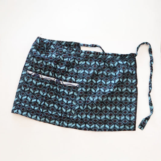 Vintage Japanese indigo kasuri cotton apron with tenugui-trimmed pockets