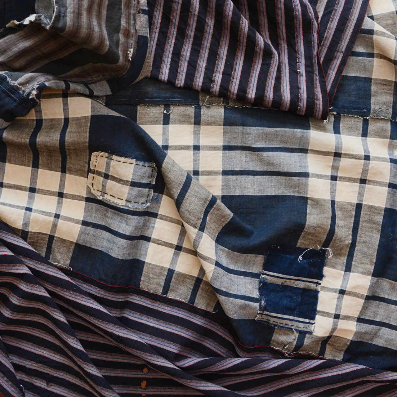 Vintage Japanese indigo boro fabric with hand-stitched repairs
